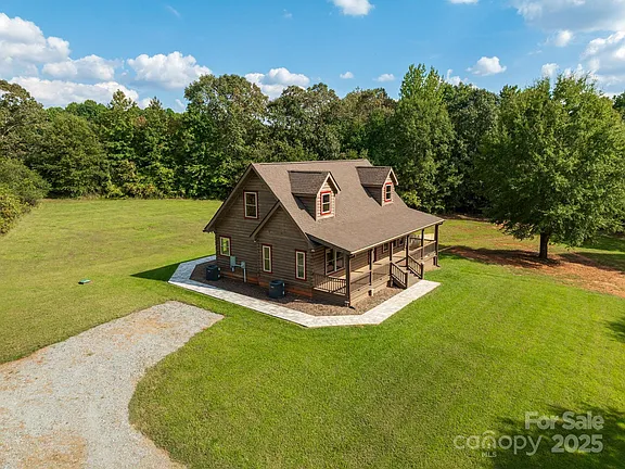 Pretty wood details and total privacy! C. 1930 in North Carolina. $595,000.