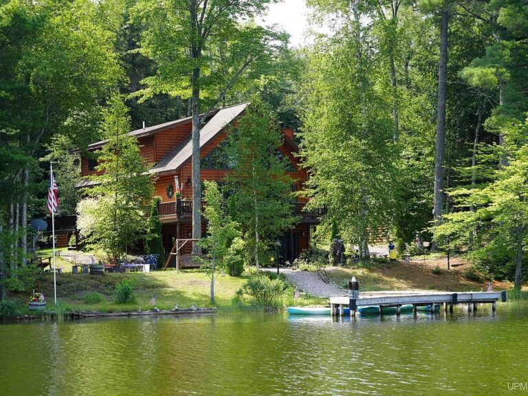 Incredible private island! Log chalet on 9 acres in Michigan. $1,770,000.