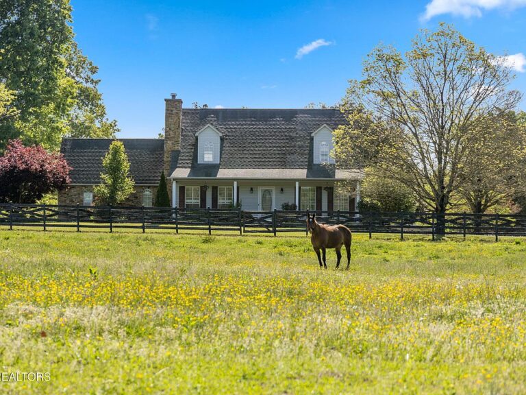 Check out that stone fireplace! Nearly 6 acres in Tennessee. $729,000.