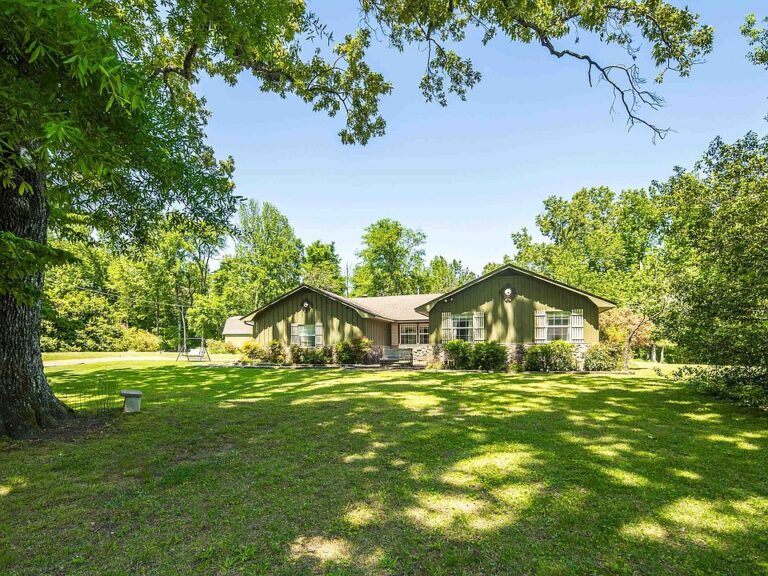 Pretty setting and workshop! One acre in Tennessee. $345,000.
