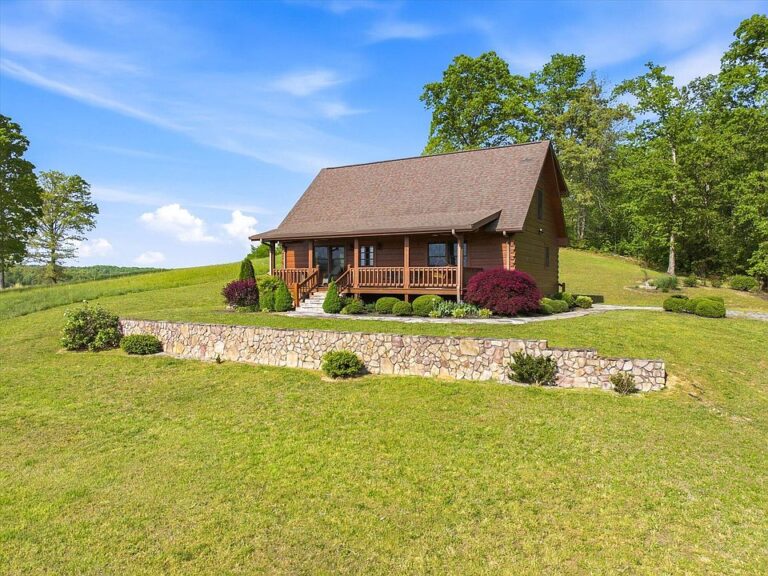 Classic log cabin! 12 rolling acres in Tennessee. $550,000.