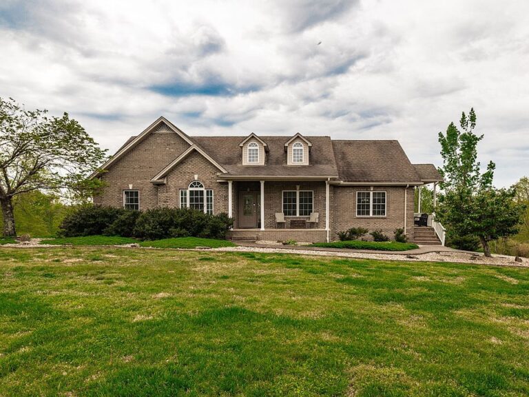 Beautiful brick home! Over 60 rolling acres in Tennessee. $924,900.