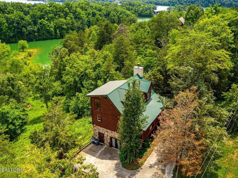 Check out the hot tub! Seasonal lakefront on 1.4 acres in Sevierville. $549,000.