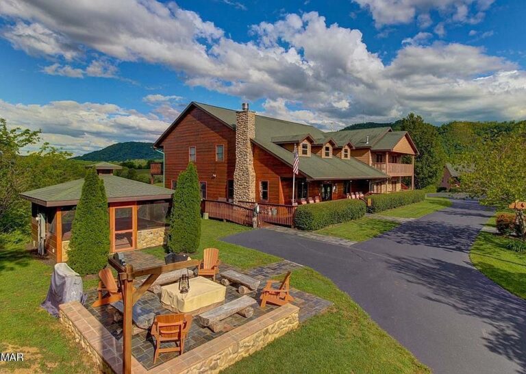 Massive mountain views! 13-suite lodge on 10 acres in Tennessee. $3,499,000.