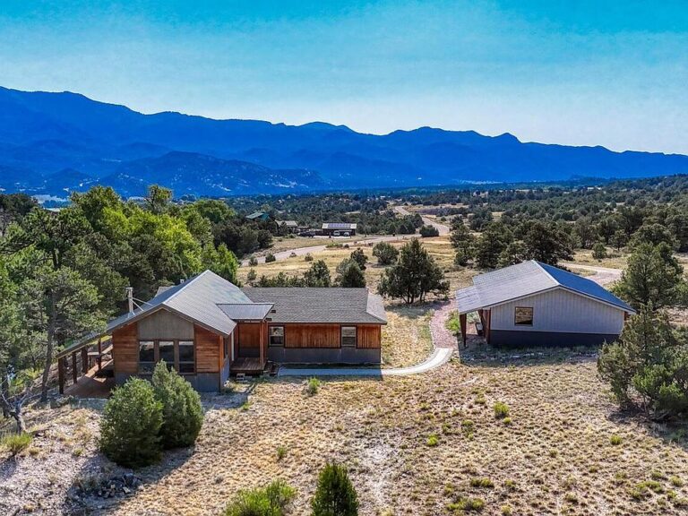 Private pond and mountain views! C. 1978 in Colorado. $637,500.
