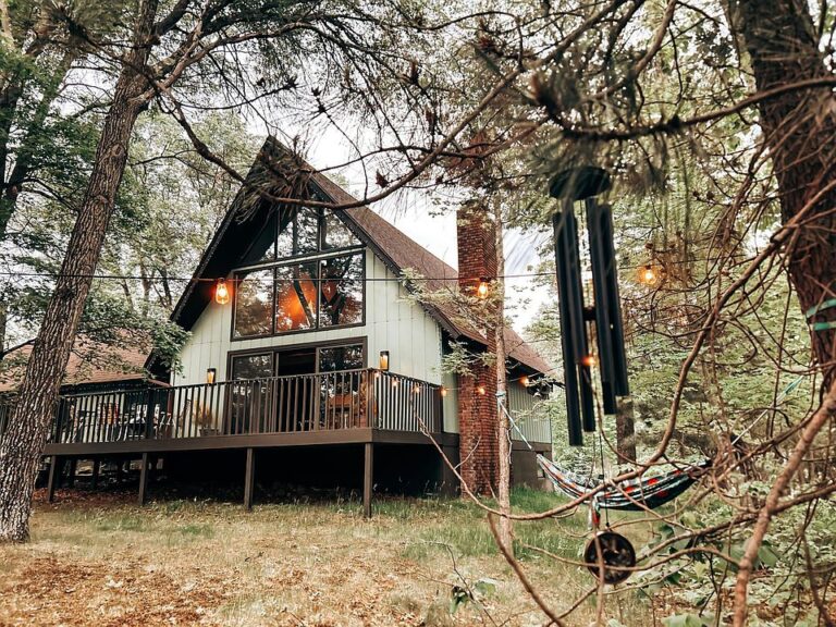 Three wood-burning fireplaces! Mid-century cabin on one acre in Wisconsin. $445,000.