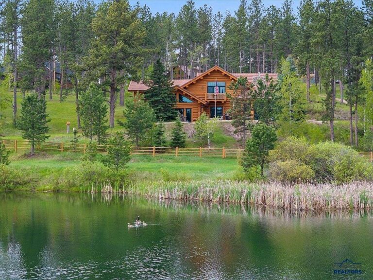 Beautiful waterfront views! C. 2003 log home in South Dakota. $1,995,000.