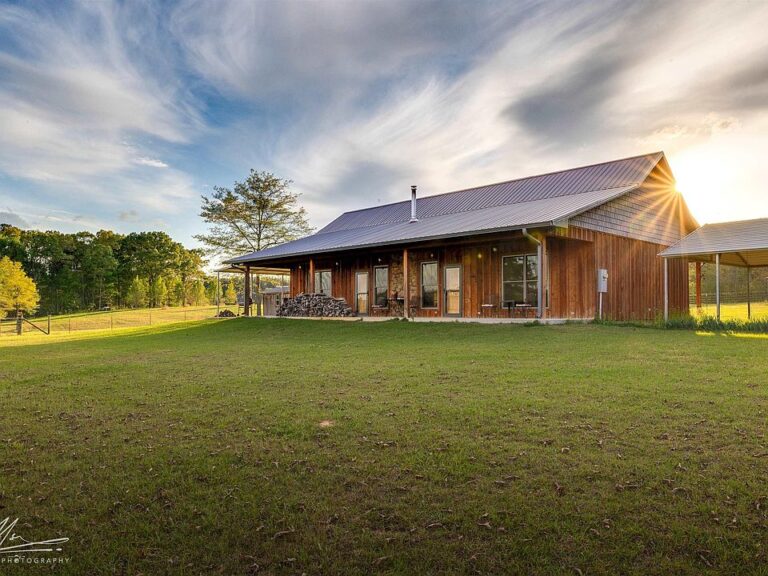 Huge wraparound porch! Over 63 acres in Alabama. $625,000.