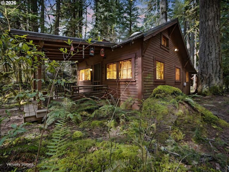 Check out that red Smeg fridge! 1928 forest cabin in Oregon. $299,000.