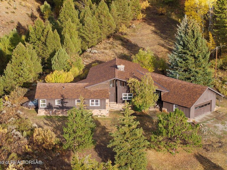 Great mountain getaway! Remodeled home on 6.81 acres in WY. $2,495,000.