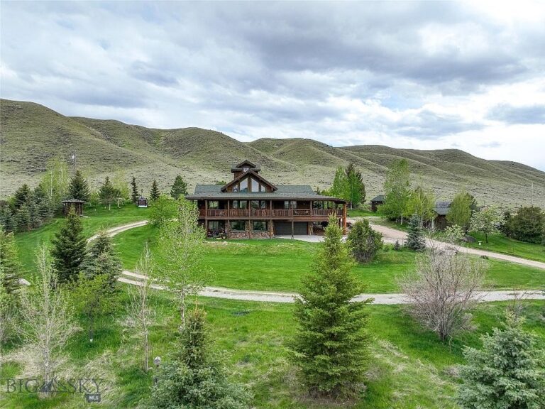 Check out the log stairs!! Custom handcrafted home on 2 acres in Montana. $1,995,000.