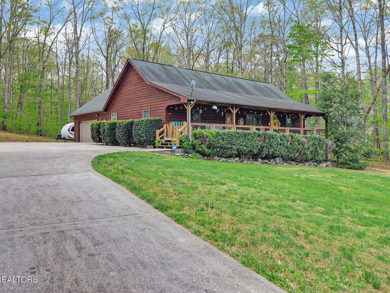 Beautiful wood details! Country cabin on 5 acres in Tennessee. $515,000.