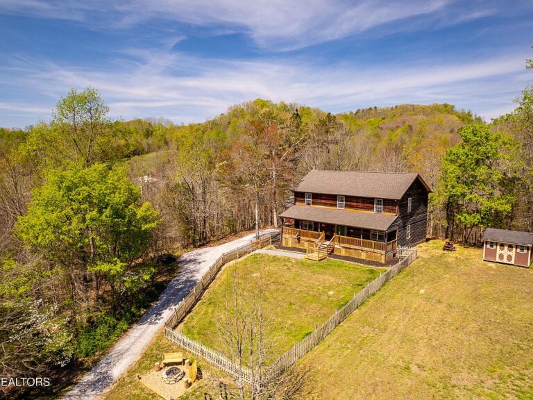 Over 50 rolling acres! Custom farmhouse in Tennessee. $795,000.