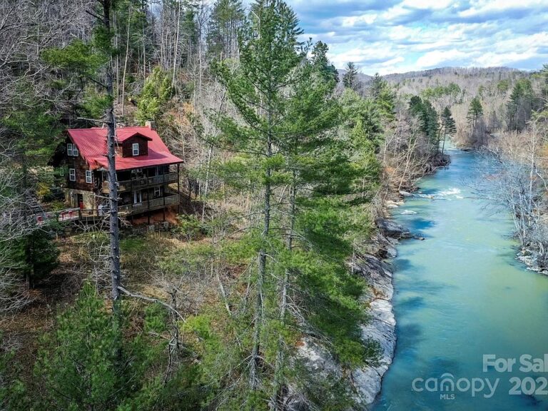Beautiful riverfront views! Log home in North Carolina. $575,000.