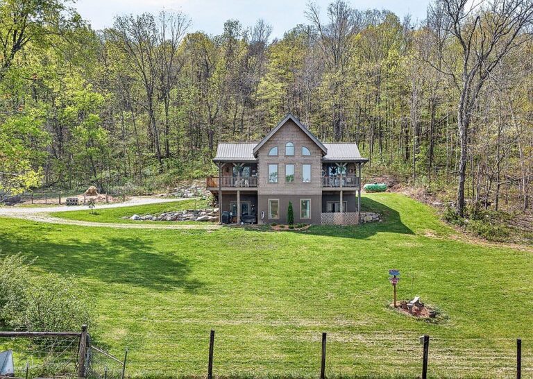 Stunning log home and mountain views! Over 27 acres in Tennessee. $829,000.