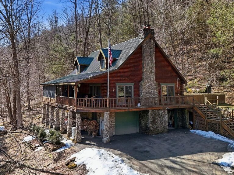 Beautiful stone fireplace! 17 riverfront acres in Pennsylvania. $579,000.
