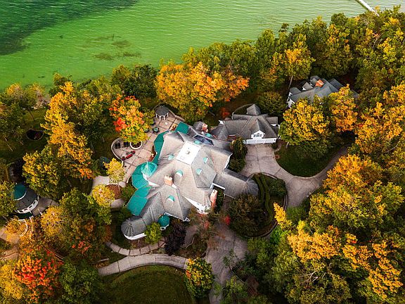 Marble fireplaces and lake views! 14 private acres in Michigan. $8,999,000.
