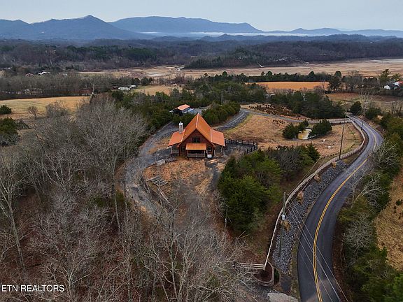 Beautiful log beams! New construction on 7 acres in Tennessee. $1,545,000.