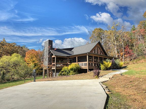 Rushing creek and meadow views! 2021 cabin in Georgia. $749,000.