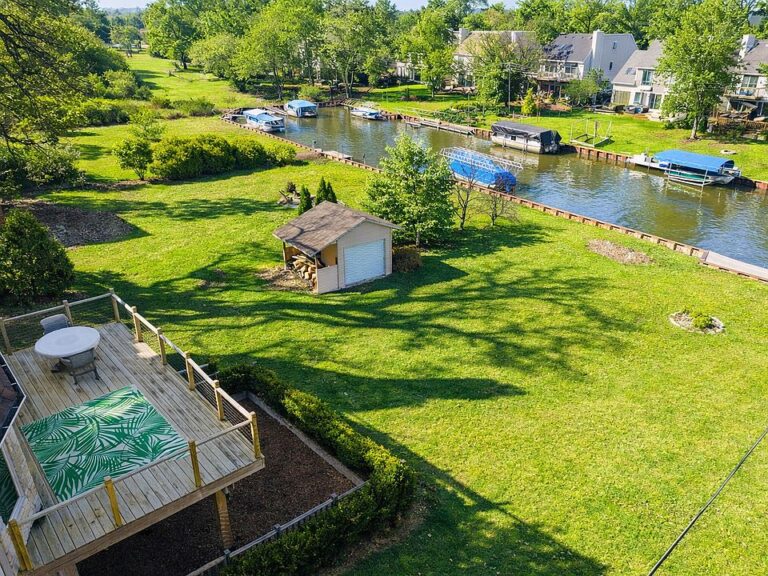 Pretty sunset views and lake access! Spacious villa-style living in IL. $849,900.