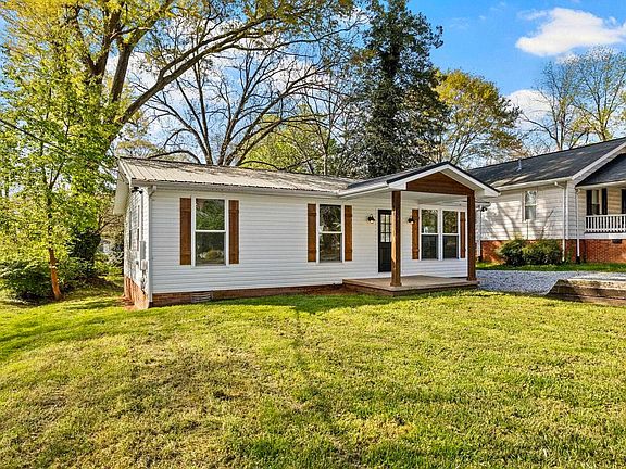 Fresh paint and newer roof! Updated gem in Greenville. $245,000.