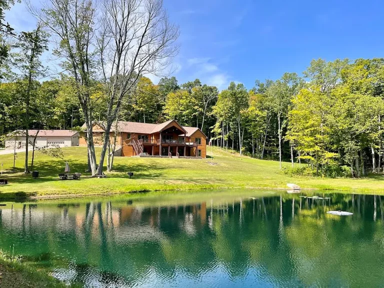 Stunning woodwork and a private pond! Over 33 acres in Ohio. $999,000.