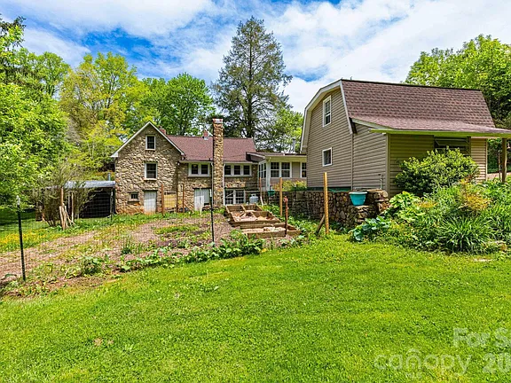Check out the chicken coop!! 1913 stone cottage on 5 acres in NC. $425,000.