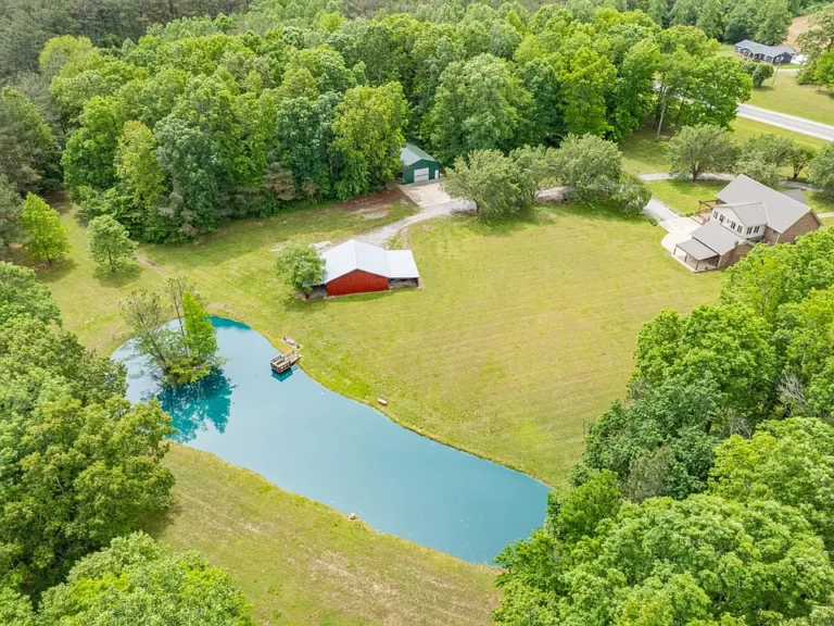 Beautiful pond and island! Over 10 acres in Tennessee. $1,095,000.