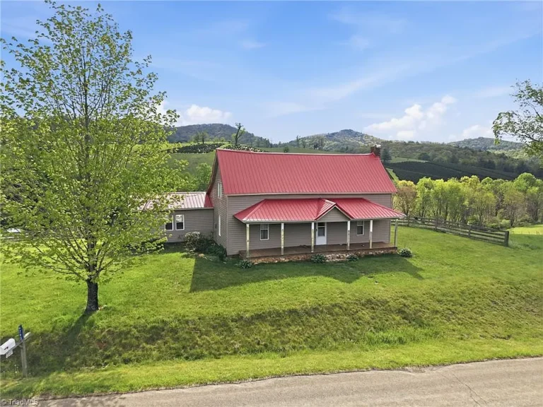 Classic farmhouse charm! Nearly 7 acres in NC. $274,900.