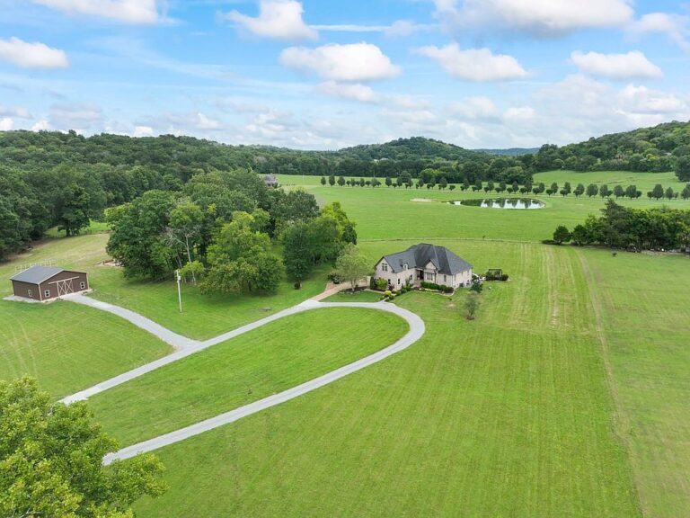 Pretty brick estate and huge shop! Over 15 private acres in TN. $1,190,000.