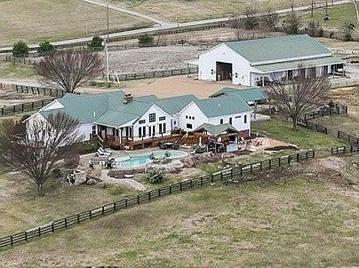 Check out the double-sided stone fireplace!! 24 rolling acres in Tennessee. $2,000,000.