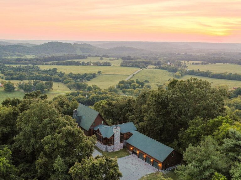Check out the finished basement and stone details!! Over 22 custom-built acres in TN. $1,499,000.