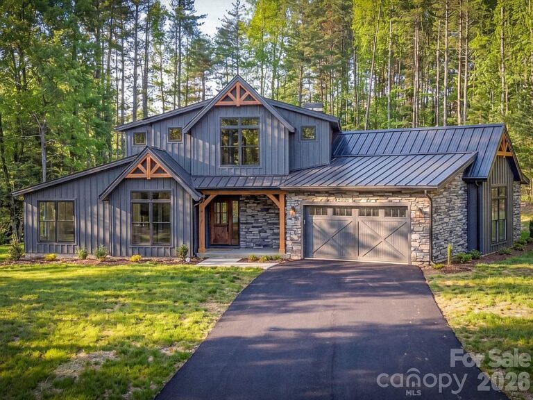 Check out the outdoor fireplace!! Over an acre in North Carolina. $900,000.