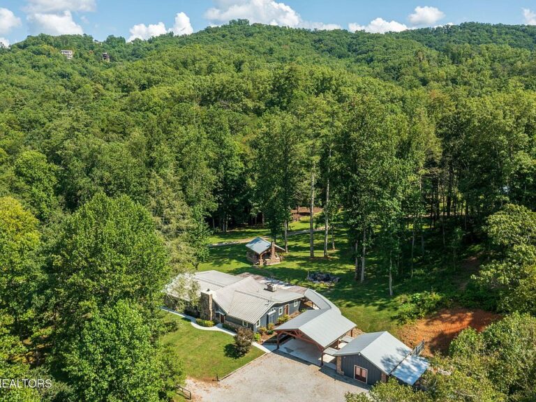 Beautiful stone fireplaces! Massive 7-bedroom lodge in Tennessee. $10,200,000.