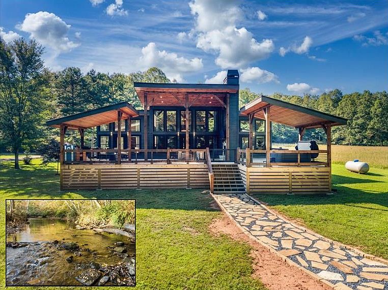 Check out the sauna and cold plunge! Brand new cabin on over 3 level acres in Georgia. $849,000.