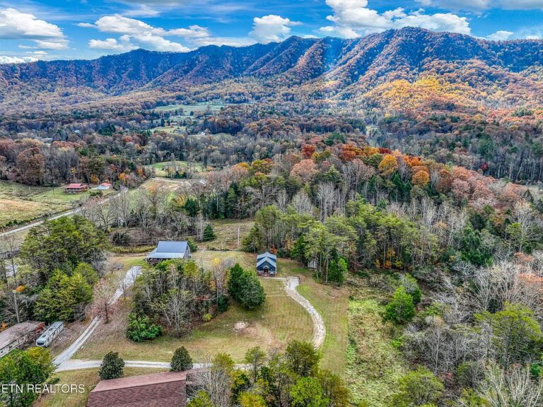 Beautiful stonework! C. 1998 cottage on the peaceful side of the Smokies. $489,000.