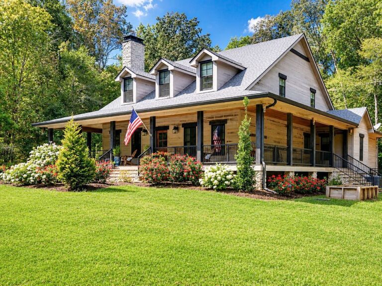 Dreamy wraparound porch! Over 2 serene acres in Tennessee. $1,099,000.