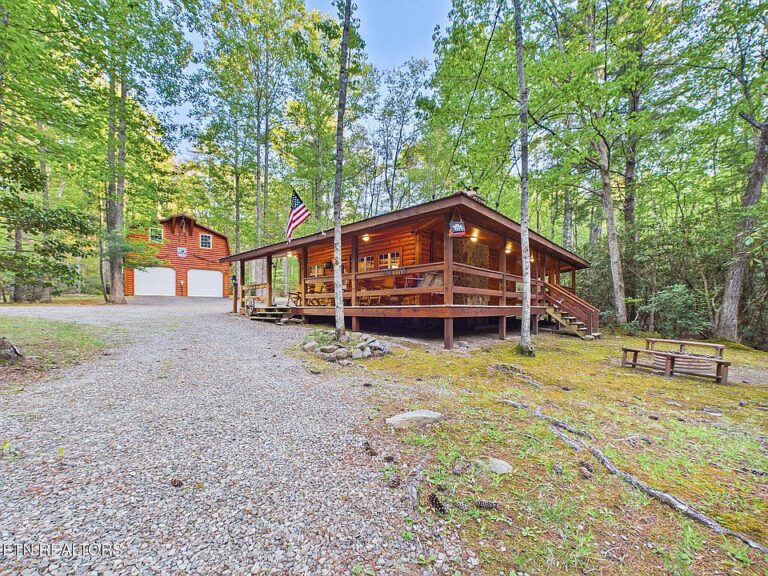 Check out the creek!! Two houses on two acres in Tennessee. $539,900.