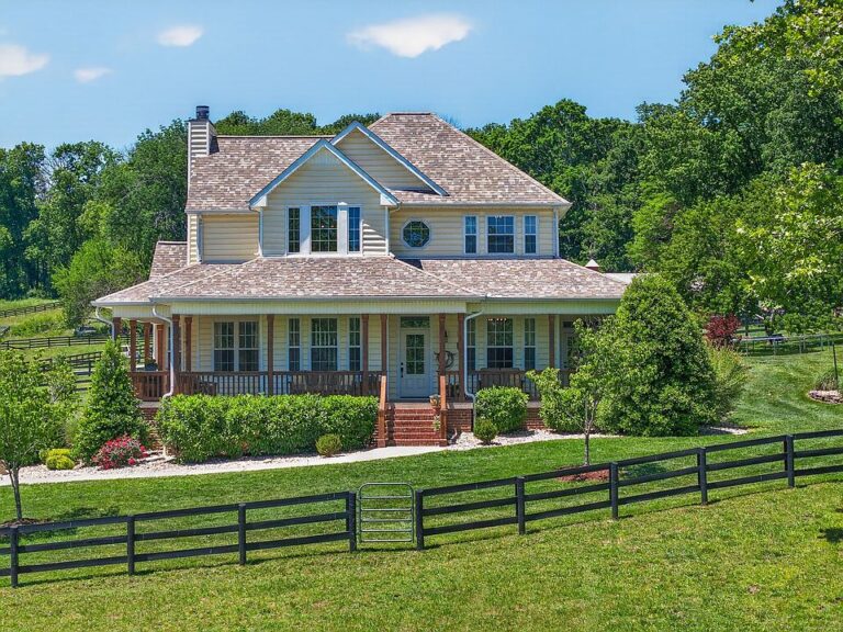 Pretty setting and a double oven! Over seven private acres in TN. $1,699,950.