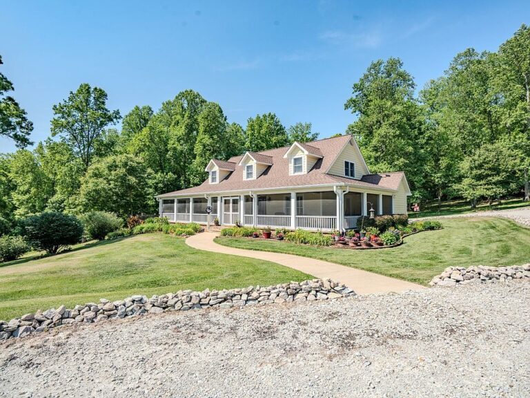 Check out that wrap-around porch!! Nearly 394 acres of rolling hills in Tennessee. $1,995,000.