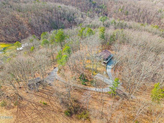 Check out those mountain views!! 7.5 acres with two homes in Tennessee. $949,000.