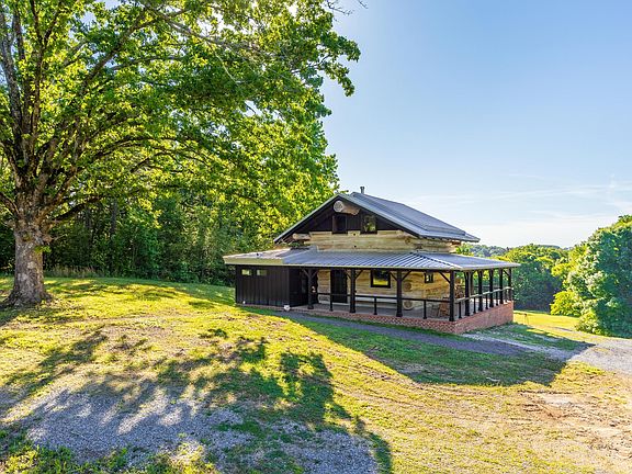 Check out the logs!! Brand new on 18 acres in Tennessee. $659,900.