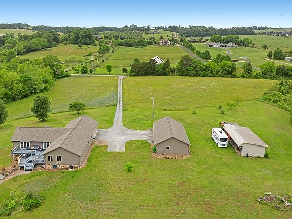 Beautiful acreage and a 5-car garage! Nearly 17 acres in Tennessee. $1,095,000.