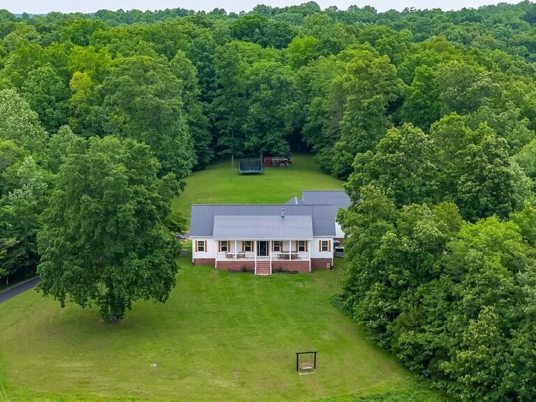 Breathtaking views and gorgeous porches! 30 stunning acres in Tennessee. $1,099,000.