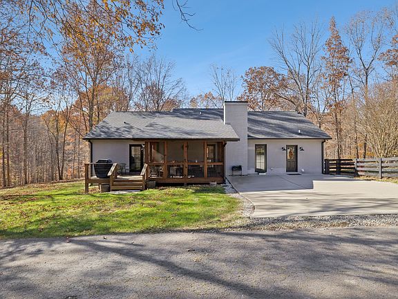 Great retreat spot! Modern updates on over 16 acres in TN. $1,399,999.