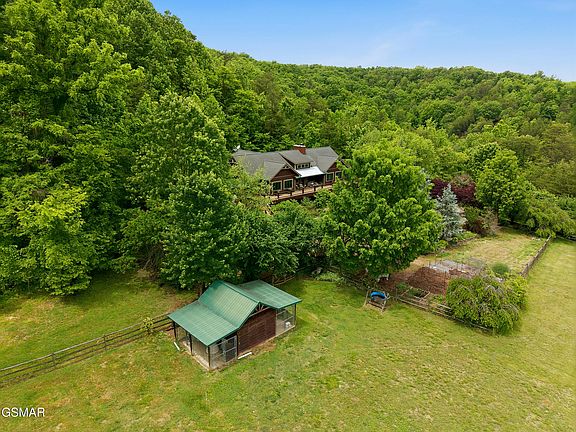 Beautiful woodwork! Incredible mountain views! Built in 2002 in Tennessee. $1,999,000.