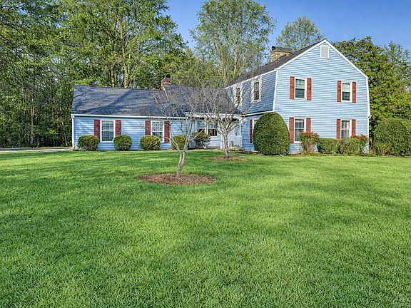 Stunning stone fireplace! 11 acres with a barn in Tennessee. $865,000.