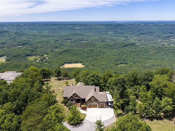 Breathtaking bluff views! Custom mountain retreat on 3.9 acres in GA. $985,000.