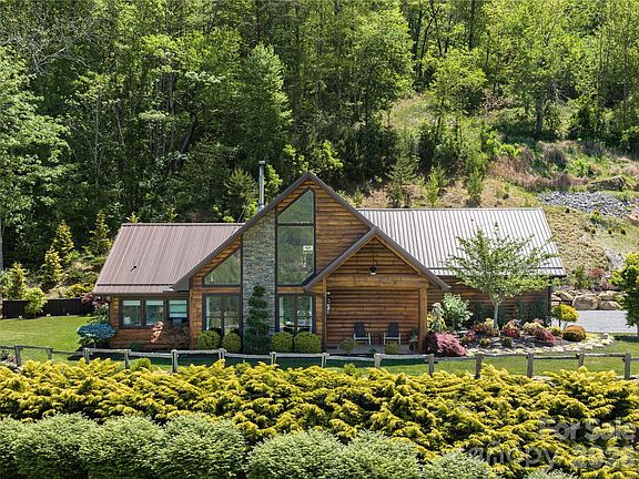 Check out the cathedral ceilings! Custom rustic cabin in NC. $1,200,000.