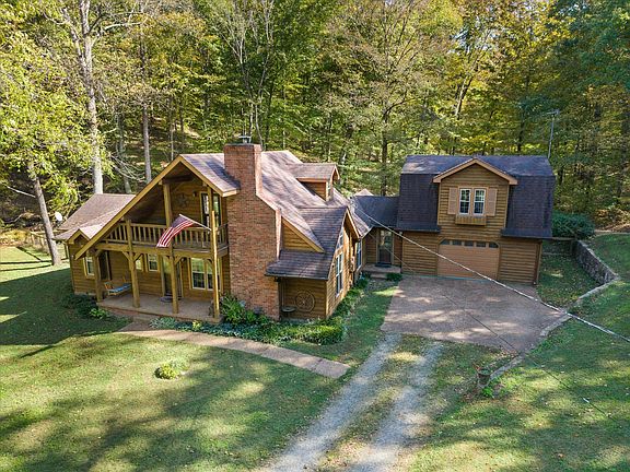 Pretty vaulted ceilings! Great balconies and views! 10 acres in TN. $1,790,000.